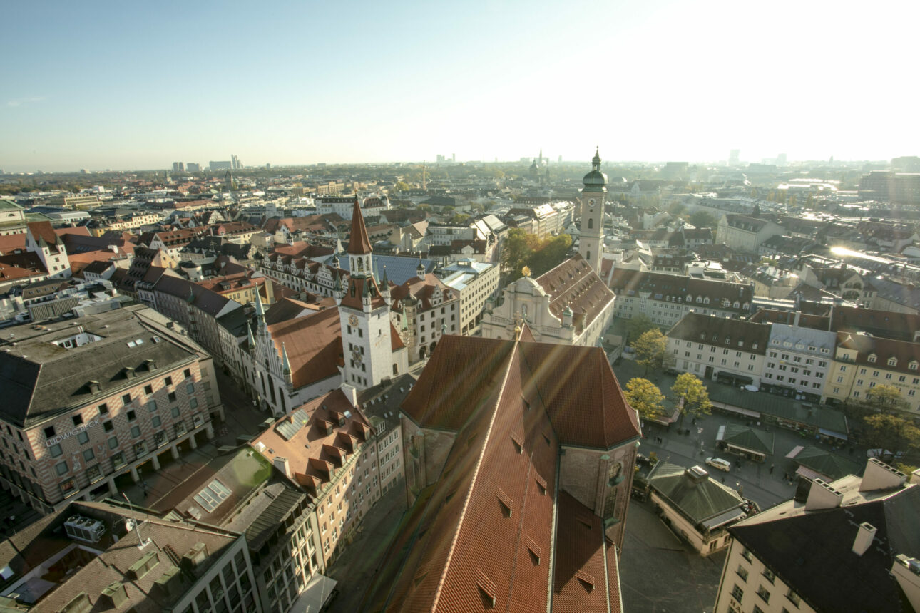 Scenic autumn aerial view of the ancient medieval gothic architecture City Hall building at the Marienplatz Market Square in Munich, Bavaria, Germany