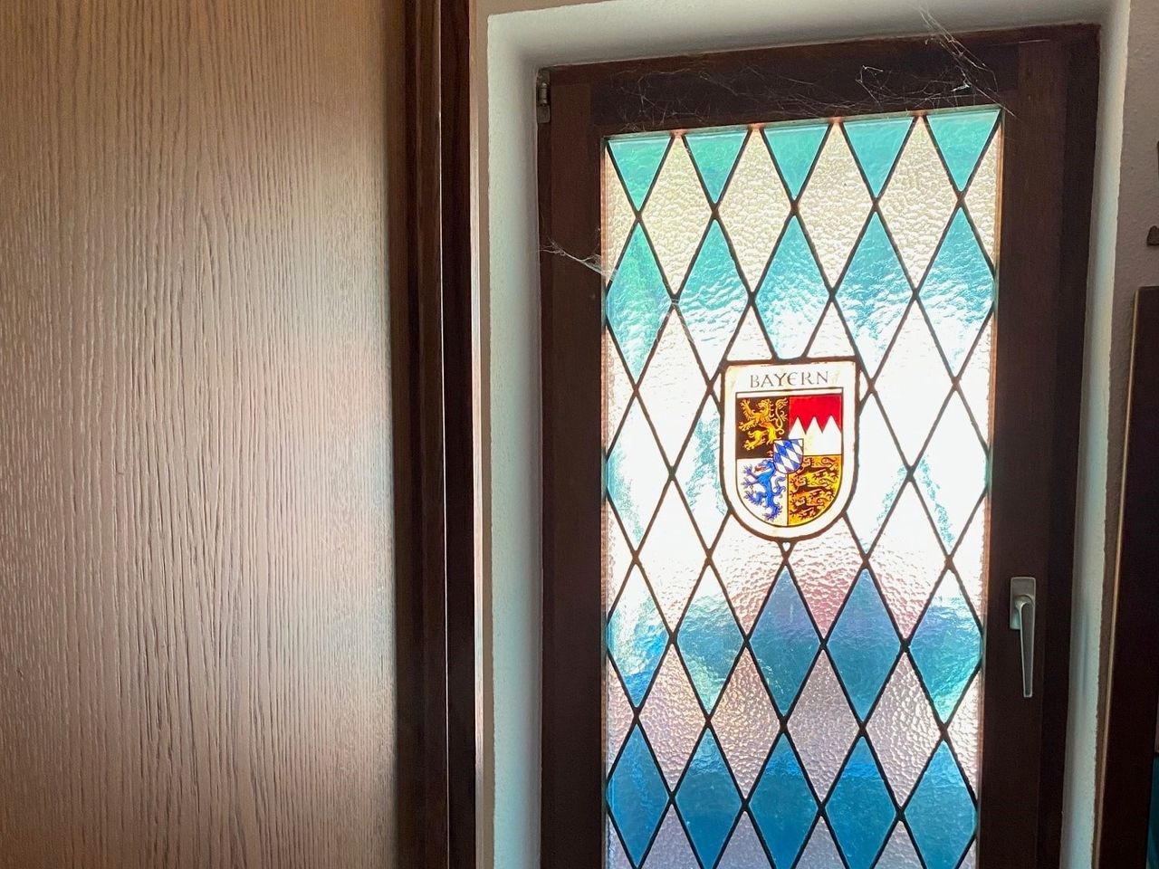 Detail Bleiverglasung mit Wappen