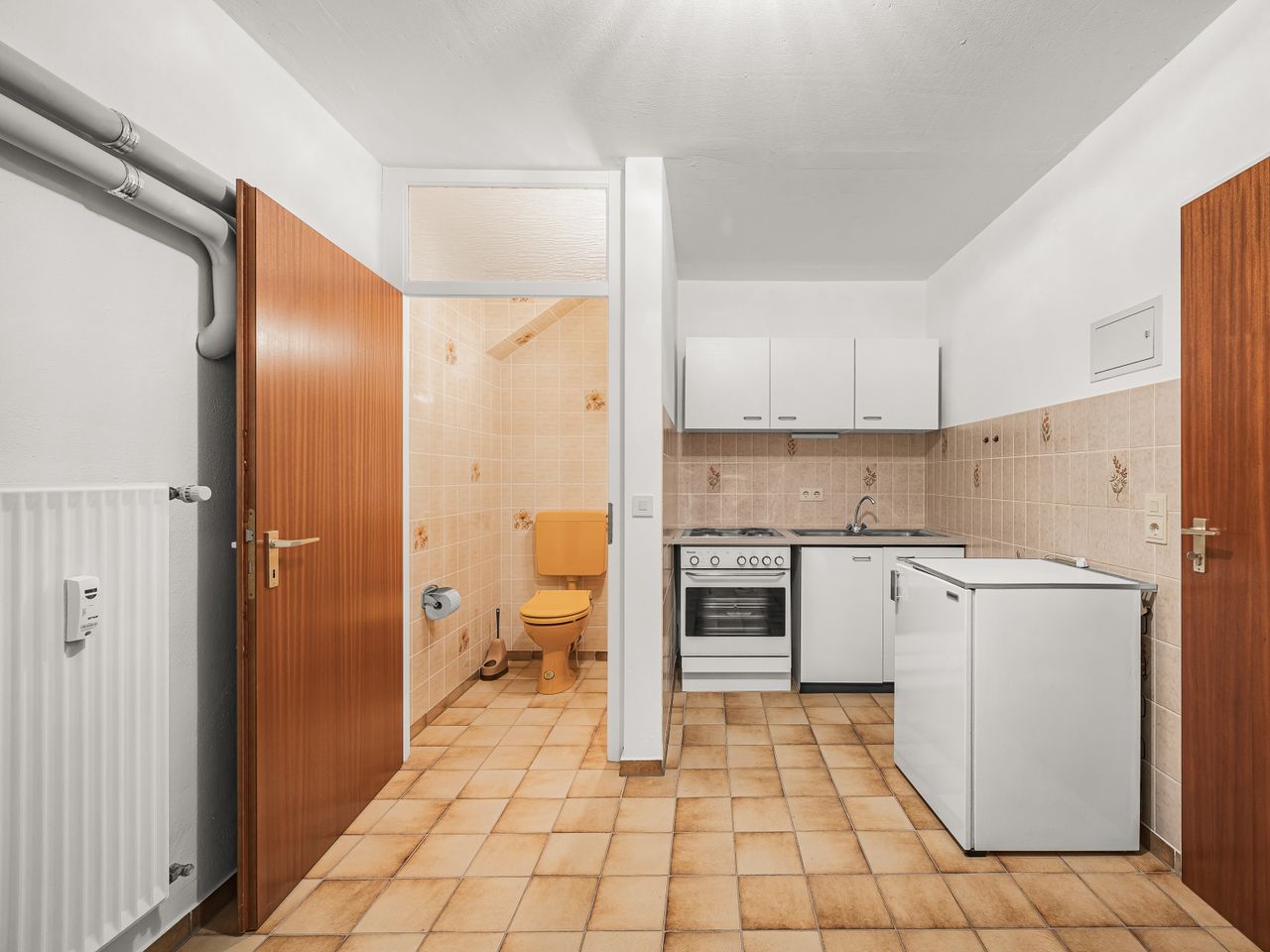 Küche und WC im UG